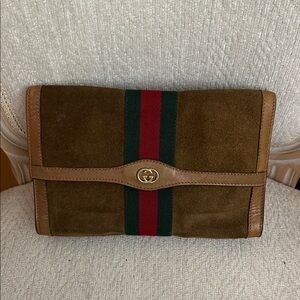 Gucci she line Brown Suede and leather clutch sells 380 plus real real authentic